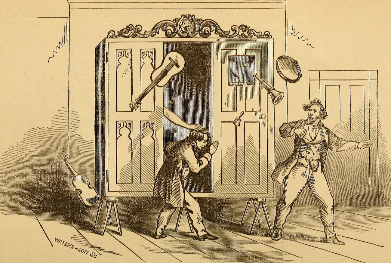 The Davenport brothers and their cabinet, 1869.